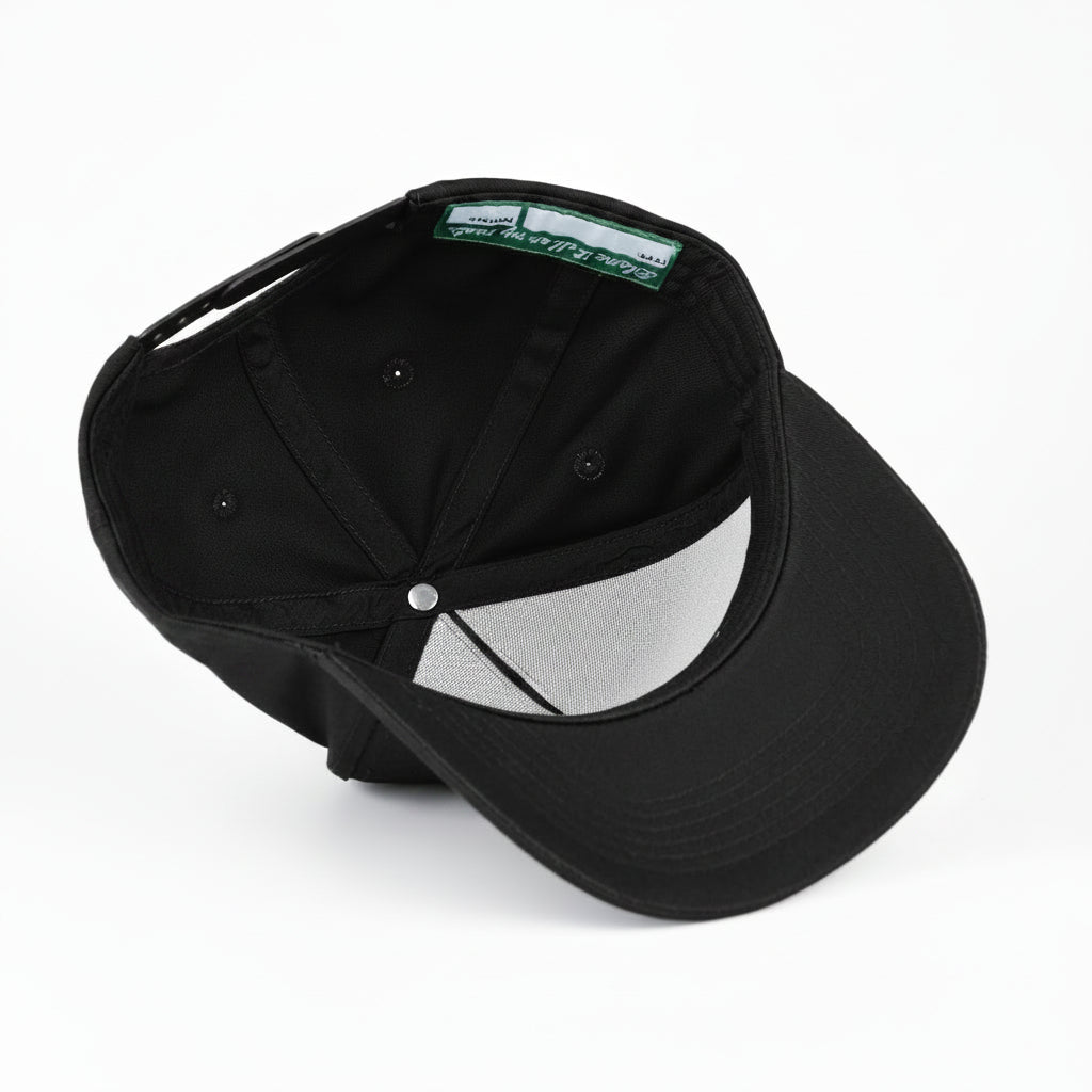 A black baseball cap shown from a three-quarters rear angle, featuring a structured blue crown, a curved brim, and a light gray mesh back panel, photographed on a seamless white background.